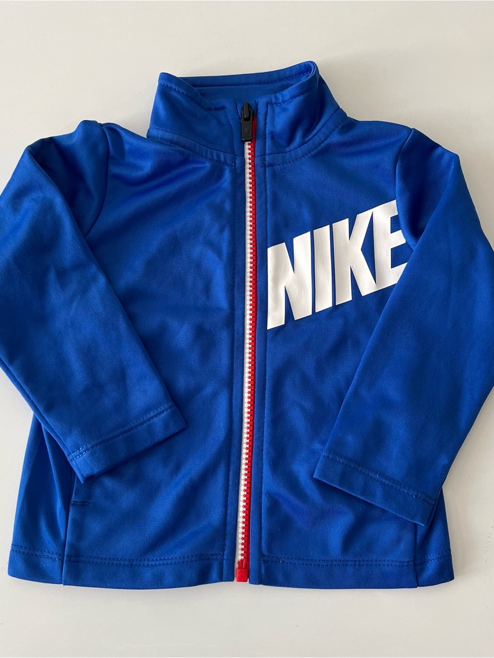 Nike Royal Blue Zip Jacket with White Logo Red Zipper Detail 24mo